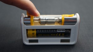 This is not the recommended way to refill your tank. Battery is still installed meaning the fire button can easily be triggered when there is no e-liquid in the atomizer; And, only the refill whole is open so it will be hard to fill tank up all the way without creating many bubbles in tank.