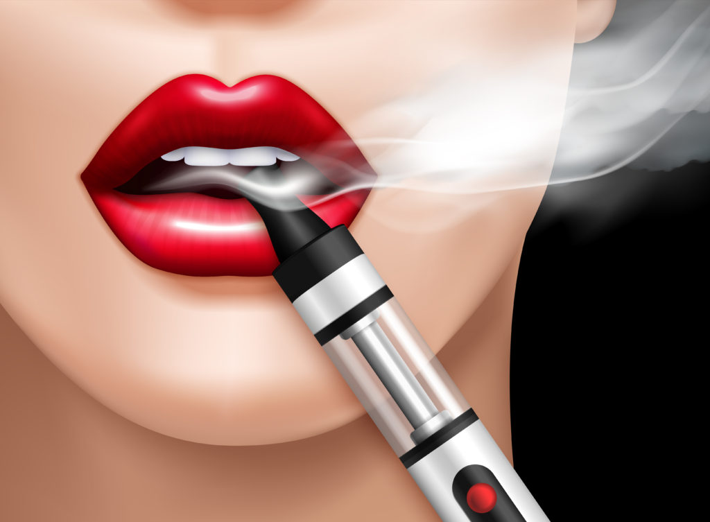 Woman vaping with the device on the side of the mouth